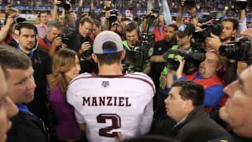 Jan 4, 2013; Arlington, TX, USA; Texas A&M Aggies quarterback Johnny Manziel (2) talks to the media after the game against the Oklahoma Sooners during the Cotton Bowl at Cowboys Stadium. Texas A&M beat Oklahoma 41-13. Mandatory Credit: Tim Heitman-USA TODAY Sports