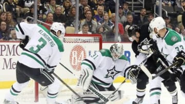 Oct 22, 2015; Pittsburgh, PA, USA; Dallas Stars goalie Antti Niemi (31) makes a save against Pittsburgh Penguins right wing Patric Hornqvist (72) as Stars defenseman John Klingberg (3) and defenseman Alex Goligoski (33) defend during the second period at the CONSOL Energy Center. The Stars won 4-1. Mandatory Credit: Charles LeClaire-USA TODAY Sports