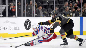 LAS VEGAS, NEVADA - DECEMBER 08: Kaapo Kakko #24 of the New York Rangers and Alex Tuch #89 of the Vegas Golden Knights fight for the puck in the third period of their game at T-Mobile Arena on December 8, 2019 in Las Vegas, Nevada. The Rangers defeated the Golden Knights 5-0. (Photo by Ethan Miller/Getty Images)