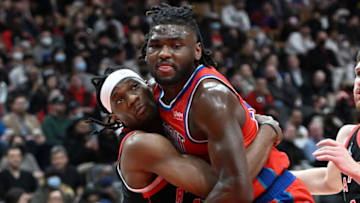 Toronto Raptors forward Precious Achiuwa (5) grapples for position with Detroit Pistons center Isaiah Stewart Credit: Dan Hamilton-USA TODAY Sports