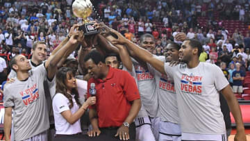 Jul 18, 2016; Las Vegas, NV, USA; Chicago Bulls players hold up the NBA Summer League championship trophy over head coach Pete Myers as he is interviewed after the Bulls defeated the Minnesota Timberwolves in overtime, 84-82 at Thomas & Mack Center. Mandatory Credit: Stephen R. Sylvanie-USA TODAY Sports