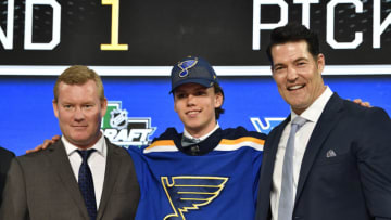 Jun 22, 2018; Dallas, TX, USA; Dominik Bokk poses for a photo with team representatives after being selected as the number twenty-five overall pick to the St. Louis Blues in the first round of the 2018 NHL Draft at American Airlines Center. Mandatory Credit: Jerome Miron-USA TODAY Sports