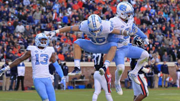 Oct 22, 2016; Charlottesville, VA, USA; North Carolina Tar Heels wide receiver Thomas Jackson (48) celebrates with Tar Heels wide receiver Ryan Switzer (3) after scoring a touchdown against the Virginia Cavaliers in the third quarter at Scott Stadium. The Tar Heels won 35-14. Mandatory Credit: Amber Searls-USA TODAY Sports