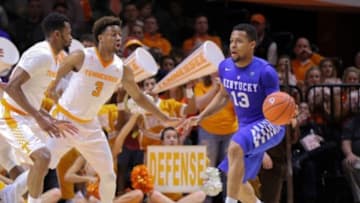 Feb 2, 2016; Knoxville, TN, USA; Tennessee Volunteers guard Kevin Punter (0) and Tennessee Volunteers guard Robert Hubbs III (3) guard Kentucky Wildcats guard Isaiah Briscoe (13) during the first half at Thompson-Boling Arena. Mandatory Credit: Randy Sartin-USA TODAY Sports