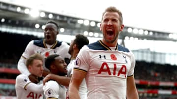 LONDON, ENGLAND - NOVEMBER 06: Harry Kane of Tottenham Hotspur celebrates scoring his sides first goal with team mates during the Premier League match between Arsenal and Tottenham Hotspur at Emirates Stadium on November 6, 2016 in London, England. (Photo by Clive Rose/Getty Images)