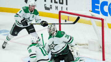 Nov 18, 2021; Saint Paul, Minnesota, USA; Dallas Stars goalie Anton Khudobin (35) allows a goal in front of defenseman Miro Heiskanen (4) during the third period against the Minnesota Wild at Xcel Energy Center. Mandatory Credit: Brace Hemmelgarn-USA TODAY Sports
