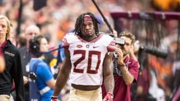 SYRACUSE, NY - NOVEMBER 19: Trey Marshall #20 of the Florida State Seminoles is walked to the locker room during the first half against the Syracuse Orange on November 19, 2016 at The Carrier Dome in Syracuse, New York. (Photo by Brett Carlsen/Getty Images)