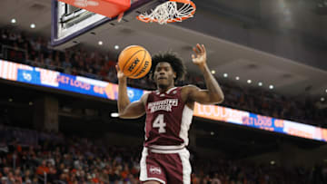 Jan 14, 2023; Auburn, Alabama, USA; Mississippi State Bulldogs guard Cameron Matthews (4) makes a dunk during the first half against the Auburn Tigers at Neville Arena. Mandatory Credit: John Reed-USA TODAY Sports