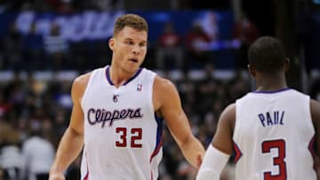 LOS ANGELES, CA - DECEMBER 28: (L-R)Blake Griffin #32 talks with teammate Chris Paul #3 of the Los Angeles Clippers during the game against the Utah Jazz at Staples Center on December 28, 2013 in Los Angeles, California. NOTE TO USER: User expressly acknowledges and agrees that, by downloading and or using this photograph, User is consenting to the terms and conditions of the Getty Images License Agreement. (Photo by Lisa Blumenfeld/Getty Images)