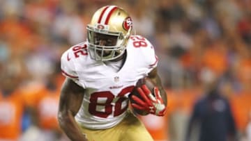 Aug 29, 2015; Denver, CO, USA; San Francisco 49ers wide receiver Torrey Smith (82) catches a pass during the first half against the Denver Broncos at Sports Authority Field at Mile High. Mandatory Credit: Chris Humphreys-USA TODAY Sports