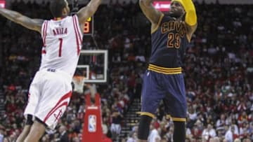 Mar 1, 2015; Houston, TX, USA; Cleveland Cavaliers forward LeBron James (23) shoots during the fourth quarter against the Houston Rockets at Toyota Center. Mandatory Credit: Troy Taormina-USA TODAY Sports