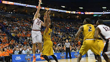 Dec 21, 2016; St. Louis, MO, USA; Illinois Fighting Illini center Maverick Morgan (22) shoots as Missouri Tigers forward Russell Woods (25) defends during a basketball game at Scottrade Center. Illinois won 75-66. Mandatory Credit: Denny Medley-USA TODAY Sports