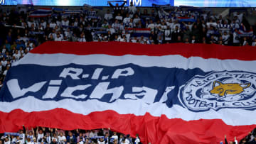 CARDIFF, WALES - NOVEMBER 03: Leicester City fans commemorate Vichai Srivaddhanaprabha by holding up scarfs and signs during the Premier League match between Cardiff City and Leicester City at Cardiff City Stadium on November 3, 2018 in Cardiff, United Kingdom. (Photo by Michael Steele/Getty Images)