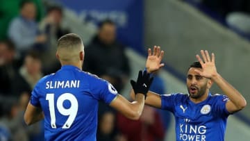 LEICESTER, ENGLAND - OCTOBER 16: Riyad Mahrez of Leicester City celebrates scoring the first Leicester goal with Islam Slimani of Leicester City during the Premier League match between Leicester City and West Bromwich Albion at The King Power Stadium on October 16, 2017 in Leicester, England. (Photo by Richard Heathcote/Getty Images)