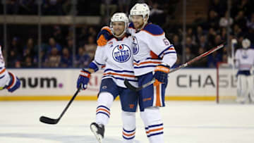 Nov 3, 2016; New York, NY, USA; Edmonton Oilers defenseman Adam Larsson (6) celebrates his goal against the New York Rangers with Edmonton Oilers defenseman Andrej Sekera (2) during the third period at Madison Square Garden. Mandatory Credit: Brad Penner-USA TODAY Sports