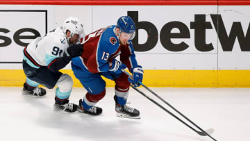 Apr 20, 2023; Denver, Colorado, USA; Colorado Avalanche right wing Valeri Nichushkin (13) controls the puck ahead of Seattle Kraken right wing Daniel Sprong (91) in the third period in game two of the first round of the 2023 Stanley Cup Playoffs at Ball Arena. Mandatory Credit: Isaiah J. Downing-USA TODAY Sports