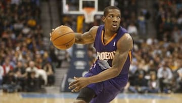 Dec 20, 2013; Denver, CO, USA; Phoenix Suns guard Eric Bledsoe (2) dribbles the ball during the first half against the Denver Nuggets at Pepsi Center. Mandatory Credit: Chris Humphreys-USA TODAY Sports