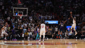 Miami Heat forward Jimmy Butler (22) puts up a shot over Charlotte Hornets forward P.J. Washington (25)(Jasen Vinlove-USA TODAY Sports)