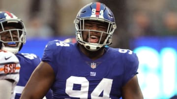 EAST RUTHERFORD, NEW JERSEY - DECEMBER 02: Dalvin Tomlinson #94 of the New York Giants celebrates his third quarter tackled against the Chicago Bears at MetLife Stadium on December 02, 2018 in East Rutherford, New Jersey. (Photo by Elsa/Getty Images)