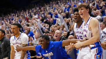 Jan 10, 2023; Lawrence, Kansas, USA; The Kansas Jayhawks bench celebrates during the second half against the Oklahoma Sooners at Allen Fieldhouse. Mandatory Credit: Jay Biggerstaff-USA TODAY Sports