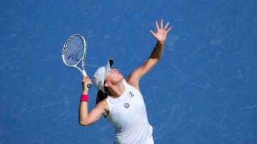 Iga Swiatek of Poland, ranked number one, prepares to make a serve to Marketa Vondrousova of the Czech Republic during the quarterfinals of the Western & Southern Open at the Lindner Family Tennis Center in Mason Friday, August, 18, 2023. Swiatek won 7-6(3), 6-1.