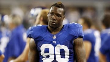 Sep 8, 2013; Arlington, TX, USA; New York Giants defensive end Jason Pierre-Paul (90) on the sidelines during the fourth quarter of the game against the Dallas Cowboys at AT