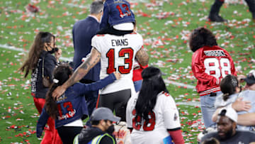 Feb 7, 2020; Tampa, FL, USA; Tampa Bay Buccaneers wide receiver Mike Evans (13) celebrates with family members after defeating the Kansas City Chiefs in Super Bowl LV at Raymond James Stadium. Mandatory Credit: Kim Klement-USA TODAY Sports