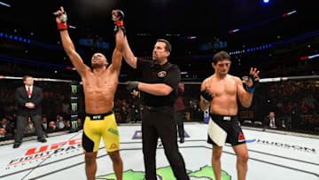 CHICAGO, IL - JULY 23: (L-R) Edson Barboza of Brazil celebrates after defeating Gilbert Melendez by unanimous decision in their lightweight bout during the UFC Fight Night event at the United Center on July 23, 2016 in Chicago, Illinois. (Photo by Josh Hedges/Zuffa LLC/Zuffa LLC via Getty Images)