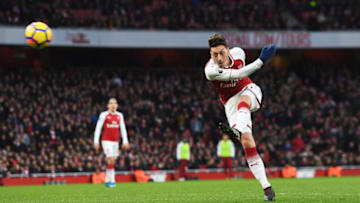 LONDON, ENGLAND - DECEMBER 16: Mesut Ozil scores a goal for Arsenal during the Premier League match between Arsenal and Newcastle United at Emirates Stadium on December 16, 2017 in London, England. (Photo by David Price/Arsenal FC via Getty Images)