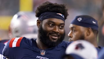 PHILADELPHIA, PA - AUGUST 19: Mike Onwenu #71 of the New England Patriots looks on against the Philadelphia Eagles in the preseason game at Lincoln Financial Field on August 19, 2021 in Philadelphia, Pennsylvania. The Patriots defeated the Eagles 35-0. (Photo by Mitchell Leff/Getty Images)