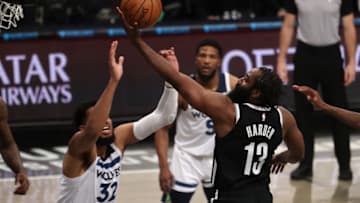 NEW YORK, NEW YORK - MARCH 29: James Harden #13 of the Brooklyn Nets shoots against Karl-Anthony Towns #32 of the Minnesota Timberwolves during their game at Barclays Center on March 29, 2021 in New York City. NOTE TO USER: User expressly acknowledges and agrees that, by downloading and/or using this Photograph, user is consenting to the terms and conditions of the Getty Images License Agreement. (Photo by Al Bello/Getty Images)