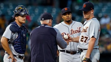 OAKLAND, CA - AUGUST 04: Jordan Zimmermann #27 of the Detroit Tigers is relieved by manager Ron Gardenhire #15 during the seventh inning against the Oakland Athletics at the Oakland Coliseum on August 4, 2018 in Oakland, California. The Oakland Athletics defeated the Detroit Tigers 2-1. (Photo by Jason O. Watson/Getty Images)