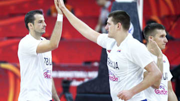 FOSHAN, CHINA - SEPTEMBER 04: #15 Nikola Jokic, #8 Nemmanja Bjelica, and #7 Bogdan Bogdanovic of the Serbia National Team looks on during the match against the Italy National Team during the 1st round of 2019 FIBA World Cup at GBA International Sports and Cultural Center on September 4, 2019 in Foshan, China. (Photo by Zhong Zhi/Getty Images)