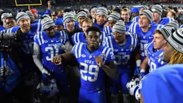 Dec 26, 2015; Bronx, NY, USA; Duke Blue Devils running back Shaun Wilson (29) dances with teammates after their 2015 New Era Pinstripe Bowl against the Indiana Hoosiers at Yankee Stadium. The Blue Devils won 44-41 in overtime. Mandatory Credit: Rich Barnes-USA TODAY Sports