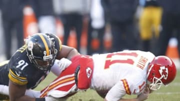 Dec 21, 2014; Pittsburgh, PA, USA; Pittsburgh Steelers defensive end Stephon Tuitt (91) sacks Kansas City Chiefs quarterback Alex Smith (11) during the fourth quarter at Heinz Field. The Steelers won 20-12. Mandatory Credit: Charles LeClaire-USA TODAY Sports