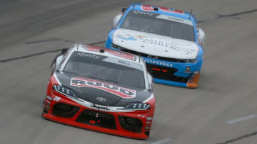 FORT WORTH, TX - MARCH 30: Christopher Bell, driver of the #20 Ruud Toyota, leads Tyler Reddick, driver of the #2 Nationwide Children's Hospital Chevrolet, during the NASCAR Xfinity Series My Bariatric Solutions 300 at Texas Motor Speedway on March 30, 2019 in Fort Worth, Texas. (Photo by Sean Gardner/Getty Images)