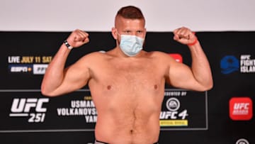 ABU DHABI, UNITED ARAB EMIRATES - JULY 10: In this handout image provided by UFC, Marcin Tybura of Poland poses on the scale during the UFC 251 official weigh-in inside Flash Forum at UFC Fight Island on July 10, 2020 on Yas Island Abu Dhabi, United Arab Emirates. (Photo by Jeff Bottari/Zuffa LLC via Getty Images)