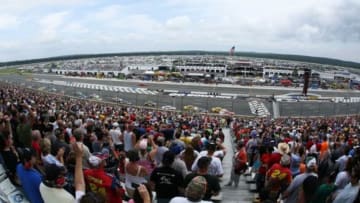 Aug 3, 2014; Long Pond, PA, USA; General view as NASCAR Sprint Cup Series drivers start lap one of the GoBowling.com 400 at Pocono Raceway. Mandatory Credit: Bill Streicher-USA TODAY Sports
