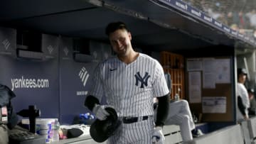 Apr 26, 2022; Bronx, New York, USA; New York Yankees left fielder Joey Gallo (13) smiles as he is ignored by teammates in the dugout after hitting a solo home run against the Baltimore Orioles during the fourth inning at Yankee Stadium. Mandatory Credit: Brad Penner-USA TODAY Sports