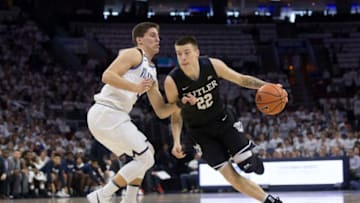 PHILADELPHIA, PA - FEBRUARY 10: Sean McDermott #22 of the Butler Bulldogs drives to the basket against Collin Gillespie #2 of the Villanova Wildcats at the Wells Fargo Center on February 10, 2018 in Philadelphia, Pennsylvania. (Photo by Mitchell Leff/Getty Images)
