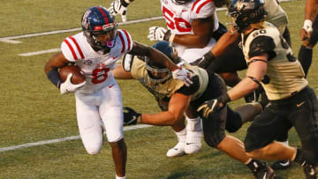 NASHVILLE, TENNESSEE - OCTOBER 31: Elijah Moore #8 of the Mississippi Rebels plays against the Vanderbilt Commodores at Vanderbilt Stadium on October 31, 2020 in Nashville, Tennessee. (Photo by Frederick Breedon/Getty Images)