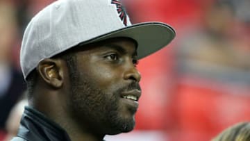 ATLANTA, GA - JANUARY 01: Former Atlanta Falcons player Michael Vick stands on the field prior to the game against the New Orleans Saints at the Georgia Dome on January 1, 2017 in Atlanta, Georgia. (Photo by Maddie Meyer/Getty Images)