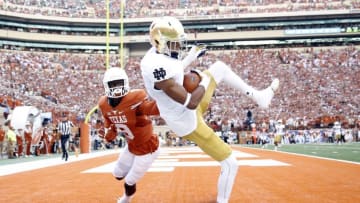Sep 4, 2016; Austin, TX, USA; Notre Dame Fighting Irish wide receiver Equanimeous St. Brown (6) makes a catch in the end zone for a touchdown while being defended by Texas Longhorns corner back Davante Davis (9) at Darrell K Royal-Texas Memorial Stadium. Mandatory Credit: Soobum Im-USA TODAY Sports