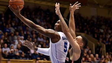DURHAM, NORTH CAROLINA - DECEMBER 18: RJ Barrett #5 of the Duke Blue Devils drives past Jaelin Llewellyn #0 of the Princeton Tigers during the first half of their game at Cameron Indoor Stadium on December 18, 2018 in Durham, North Carolina. (Photo by Grant Halverson/Getty Images)