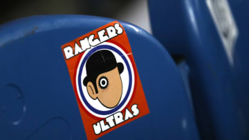 GLASGOW, SCOTLAND - MARCH 12: A Rangers fan sticker is seen on a seat inside the stadium prior to the UEFA Europa League round of 16 first leg match between Rangers FC and Bayer 04 Leverkusen at Ibrox Stadium on March 12, 2020 in Glasgow, United Kingdom. (Photo by Ian MacNicol/Getty Images)
