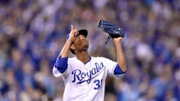 Kansas City Royals starting pitcher Yordano Ventura reacts after the San Francisco Giants' Buster Posey hit into a double play to end a bases-loaded threat in the third inning during Game 6 of the World Series at Kauffman Stadium in Kansas City, Mo., on Tuesday, Oct. 28, 2014. The Royals won, 10-0, to force a Game 7. (John Sleezer/Kansas City Star/MCT via Getty Images)