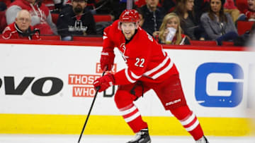 Nov 16, 2014; Raleigh, NC, USA; Carolina Hurricanes forward Zach Boychuk (22) skates with the puck against the San Jose Sharks at PNC Arena. The San Jose Sharks defeated the Carolina Hurricanes 2-0. Mandatory Credit: James Guillory-USA TODAY Sports