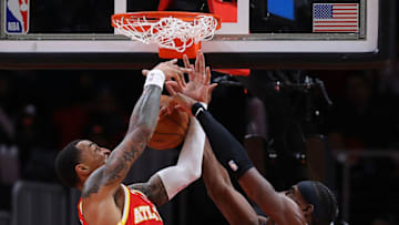John Collins #20 of the Atlanta Hawks battles for a rebound against Jalen Duren #0 of the Detroit Pistons (Photo by Kevin C. Cox/Getty Images)