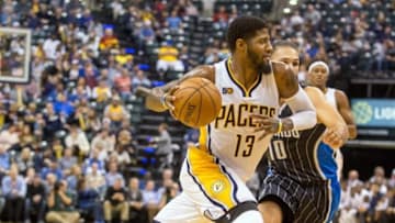 Nov 14, 2016; Indianapolis, IN, USA; Indiana Pacers forward Paul George (13) dribbles the ball in the second half of the game against the Orlando Magic at Bankers Life Fieldhouse. Indiana Pacers beat the Orlando Magic by the score 88-69. Mandatory Credit: Trevor Ruszkowski-USA TODAY Sports