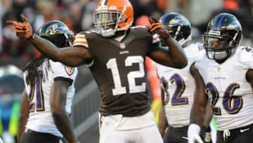 Nov 3, 2013; Cleveland, OH, USA; Cleveland Browns wide receiver Josh Gordon (12) signals first down after a catch against the Baltimore Ravens during the first quarter at FirstEnergy Stadium. Mandatory Credit: Ken Blaze-USA TODAY Sports